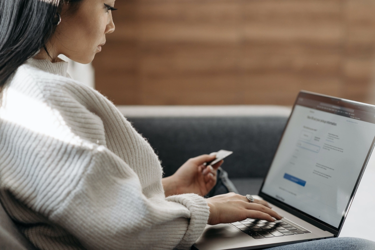 Woman paying bills online